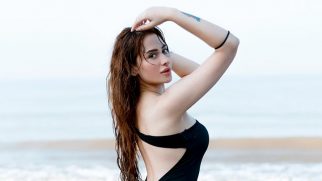 Water baby! Mahira Sharma enjoys some beachy waves in this sizzling black dress