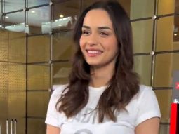 Manushi Chhillar sports a casual look as she poses for a picture with fan at the airport