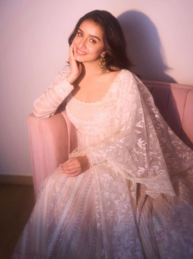 Shraddha Kapoor appears enchantingly divine in an exquisite white Anarkali suit adorned with intricate embroidery