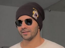 Varun Dhawan poses with fans as he gets clicked in a beanie