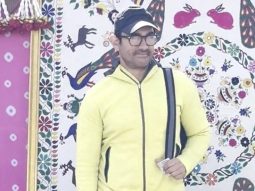Aamir Khan poses for paps in a bright yellow hoodie as he leaves from Jamnagar