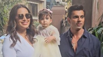 Baby Devi looks amused as she poses for paps with mumma-papa, Bipasha & Karan Singh Grover