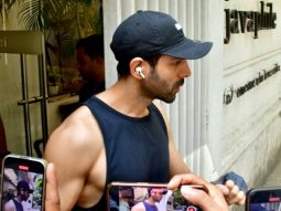 Kartik Aaryan smiles as paps request him to flaunt his perfectly carved body