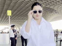 Parineeti Chopra rocks an all white airport look as she smiles for paps