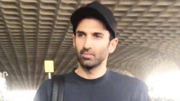 Aditya Roy Kapur strikes a pose for paps as he gets clicked at the airport