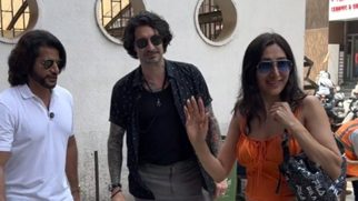 Daniel Weber poses with Karanvir Bohra and his wife Teejay Sidhu as they step out in the city