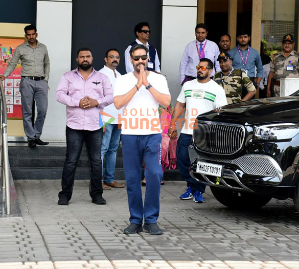 Photos: Ajay Devgn snapped with son Yug at Kalina airport Photos: Ajay Devgn snapped with son Yug at Kalina airport