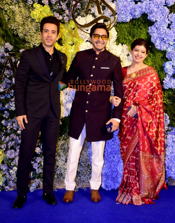 Photos: Producer Anand Pandit and family snapped with daughter, Aishwarya, and son-in-law Sahil at their wedding reception