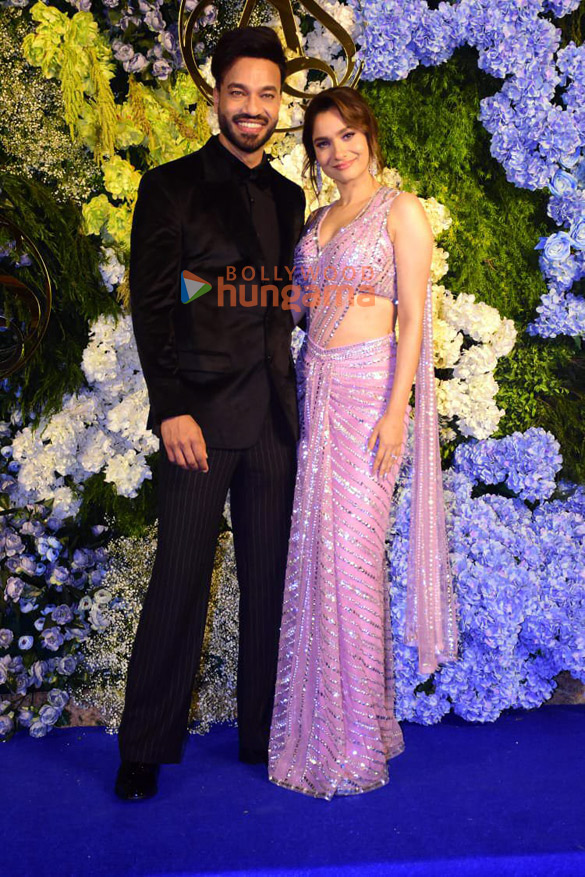 photos producer anand pandit and family snapped with daughter aishwarya and son in law sahil at their wedding reception 24