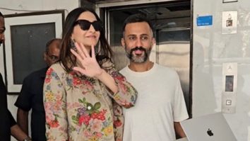 Sonam Kapoor poses with husband Anand Ahuja in her floral outfit