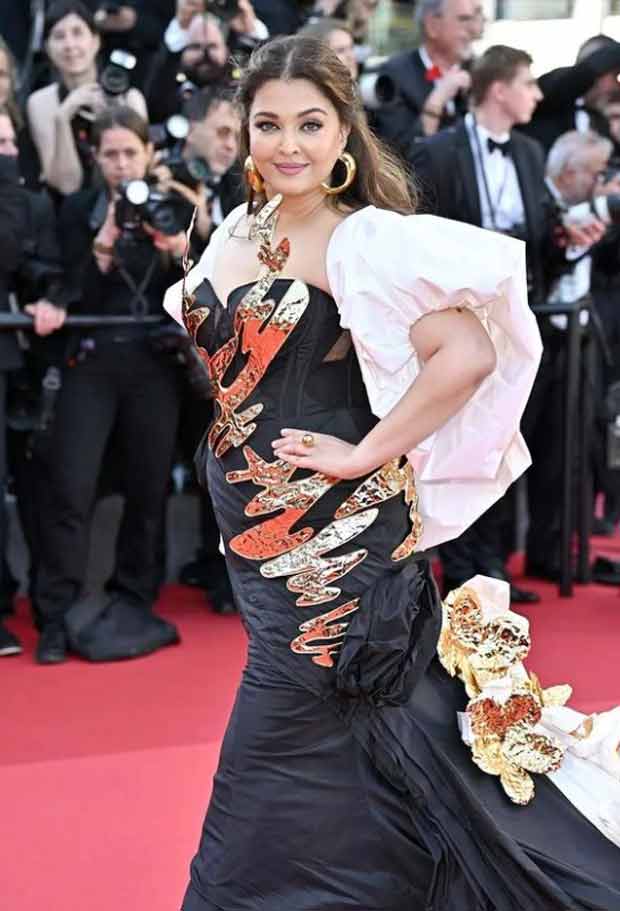 Cannes 2024 Aishwarya Rai Bachchan dazzles in Falguni Shane Peacock floor-sweeping black and white gown with gold detailing at Megalopolis world premiere 