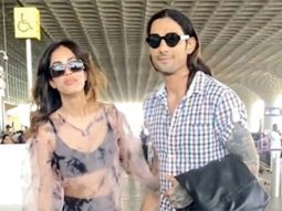 Prateik Babbar strikes a pose with Priya Banerjee as they get clicked at the airport