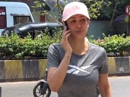 Malaika Arora greets paps with a smile as she gets clicked for her workout session