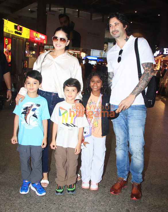 Photos: Sunny Leone and Daniel Weber snapped at airport Photos: Sunny Leone and Daniel Weber snapped at airport