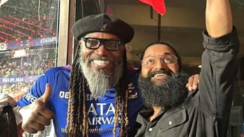 Rishab Shetty poses with Chris Gayle during RCB vs CSK match