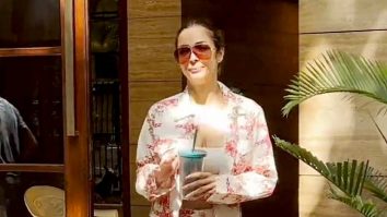 Malaika Arora waves at paps as she rushes towards to her car