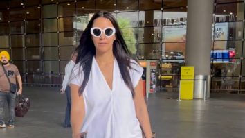 Neha Dhupia poses for a selfie with fans at the airport