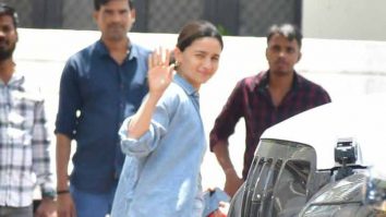 Alia Bhatt flashes a smile for paps as she gets clicked