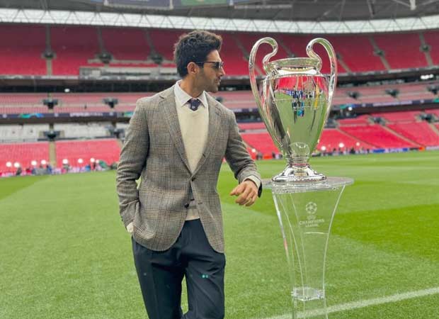 Kartik Aaryan strikes a pose with the 2024 UEFA Champions League Trophy, see photo Kartik Aaryan strikes a pose with the 2024 UEFA Champions League Trophy, see photo