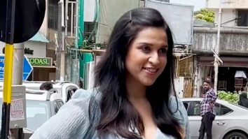 Mannara Chopra is all smiles as she poses for paps in a baby blue outfit