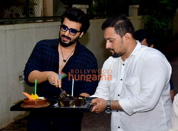photos arjun kapoor snapped celebrating birthday with fans and media cuts cake 3