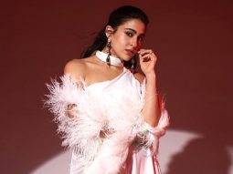 Sara Ali Khan brings elegance in a white cut-out dress paired with a luxurious fur-enrich cape