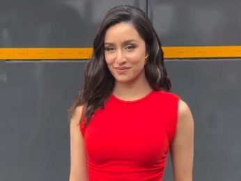 Shraddha Kapoor smiles for paps in a red top & denims