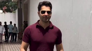 Varun Dhawan poses with fans as he gets clicked in the city