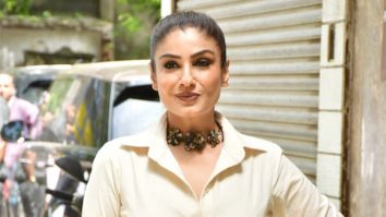 Classy and elegant! Raveena Tandon strikes a pose for paps