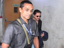 Paps try hard to capture a glimpse of the one and only Shah Rukh Khan!