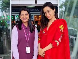 Shraddha Kapoor pose with fans at the airport in her red salwar
