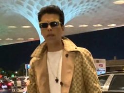 The God of classy airport look arrives in style! Karan Johar
