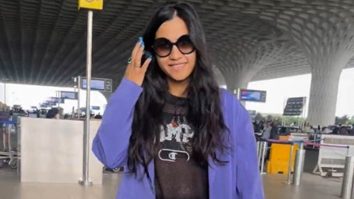 A happy and cheerful Nikhita Gandhi gets clicked at the airport