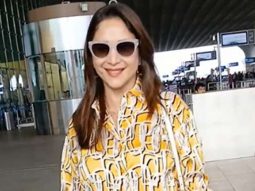 Madhuri Dixit strikes a pose for paps at the airport in her stylish look