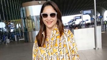 Madhuri Dixit strikes a pose for paps at the airport in her stylish look