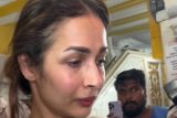 Malaika Arora gets clicked in white at father Anil Mehta’s prayer meet