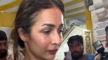 Malaika Arora gets clicked in white at father Anil Mehta’s prayer meet
