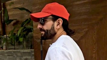 Saif Ali Khan poses for paps in a white kurta and denims