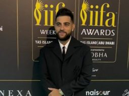 Karan Aujla poses with wife Palak Aujla at IIFA 2024 red carpet
