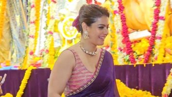 Moment of the day Yug kissing mom Kajol during Durga pooja