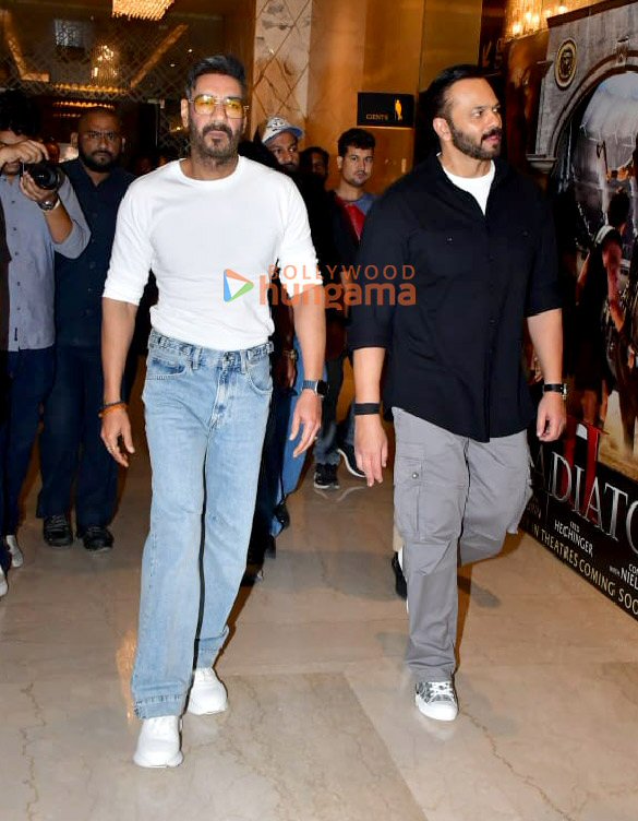 photos ajay devgn and rohit shetty snapped at a multiplex screening singham part 1 to interact with fans and promote singham again 8