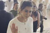 Sara Ali Khan papped wearing a white shimmery dress