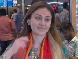 Shefali Jariwala returning from kumb, poses for the paps