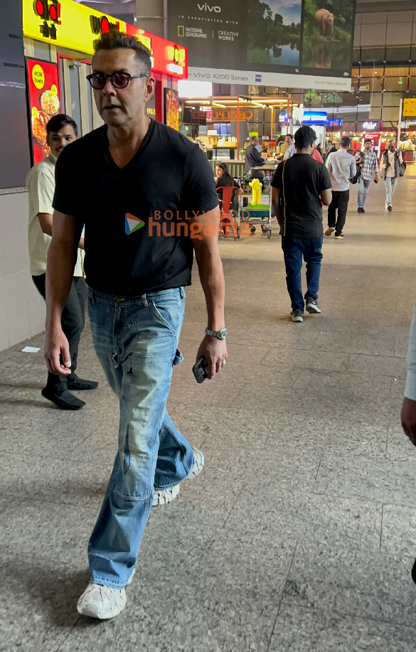photos bobby deol and sherlyn chopra snapped at the airport 1
