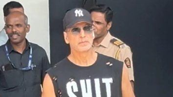 Akshay Kumar in a cool sando which says SHIT HAPPENS