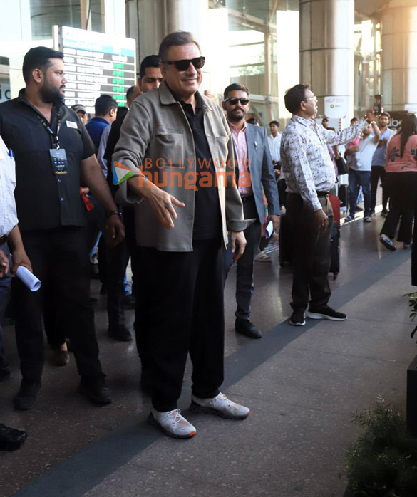 photos shah rukh khan kartik aaryan karan johar and boman irani snapped at jaipur airport for iifa 2025 2