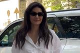 Karishma Tanna’s chic denim & white shirt look