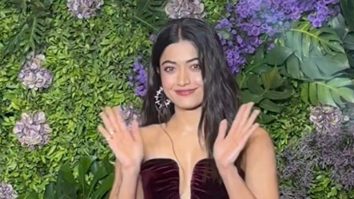 Rashmika Mandanna poses in a glam red velvet gown
