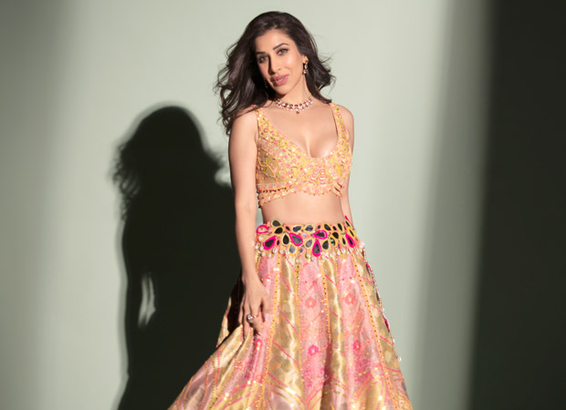 Sophie Choudry redefines Bridal elegance in a stunning yellow and pink lehenga