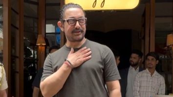 Aamir Khan smiles at paps as he gets clicked at a restaurant in Bandra